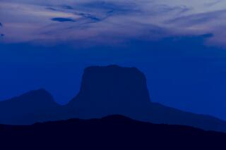 Chief Mountain Moonlight — mountains; photograph by Nathan Larson.