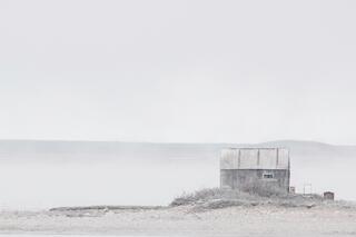Edge of the Arctic Ocean — building; photograph by Nathan Larson.