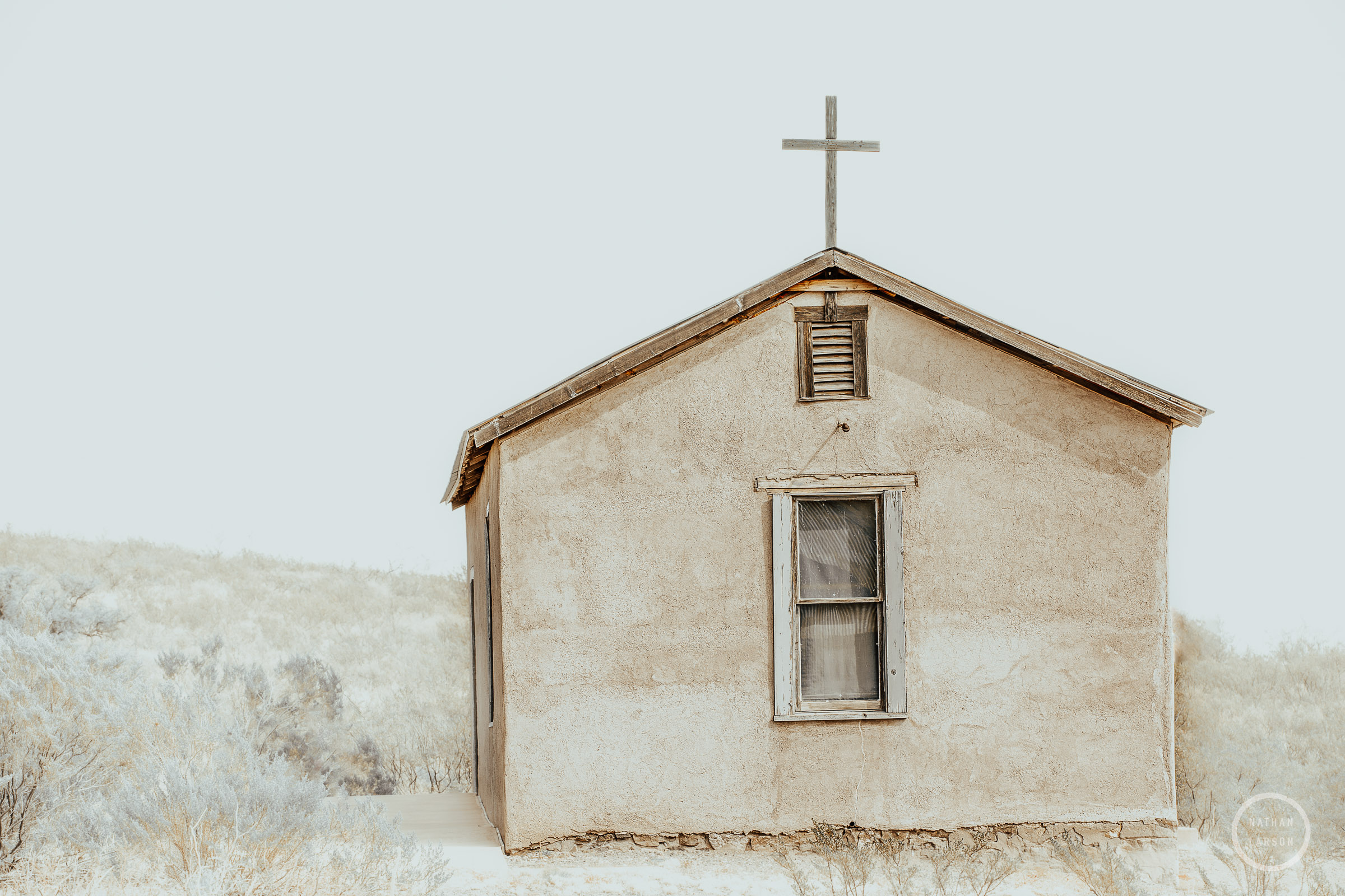 In an abandoned town in southern New Mexico, the remnants of a single room chruch stand on a small rise overlooking the valley...